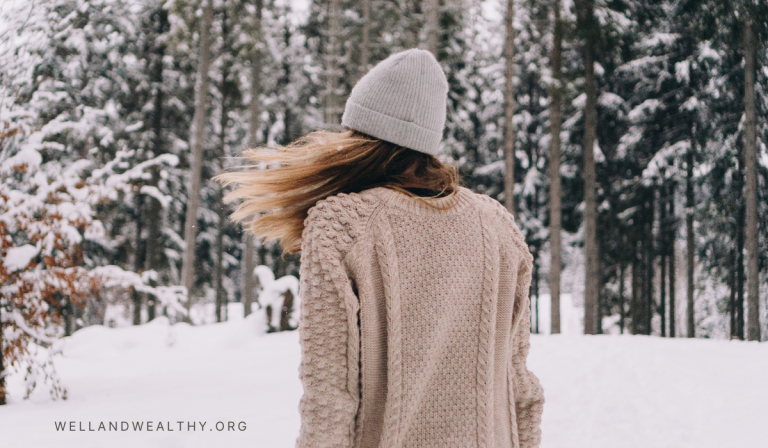 woman walking in snow feeling happy know that she has learned seasonal depression tips to help you get through the gloomy months